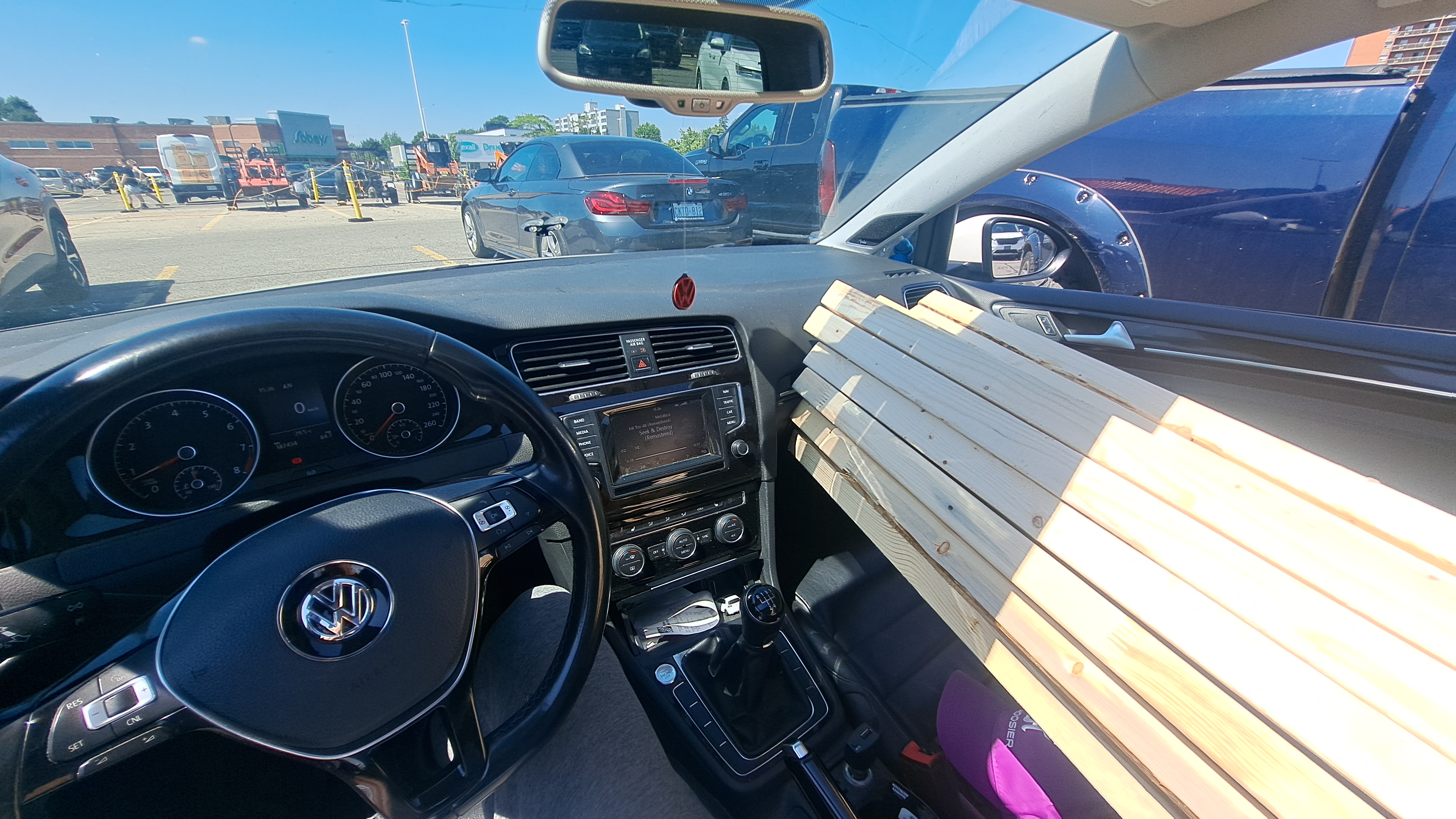 Image of many wooden studs loaded in my hatchback