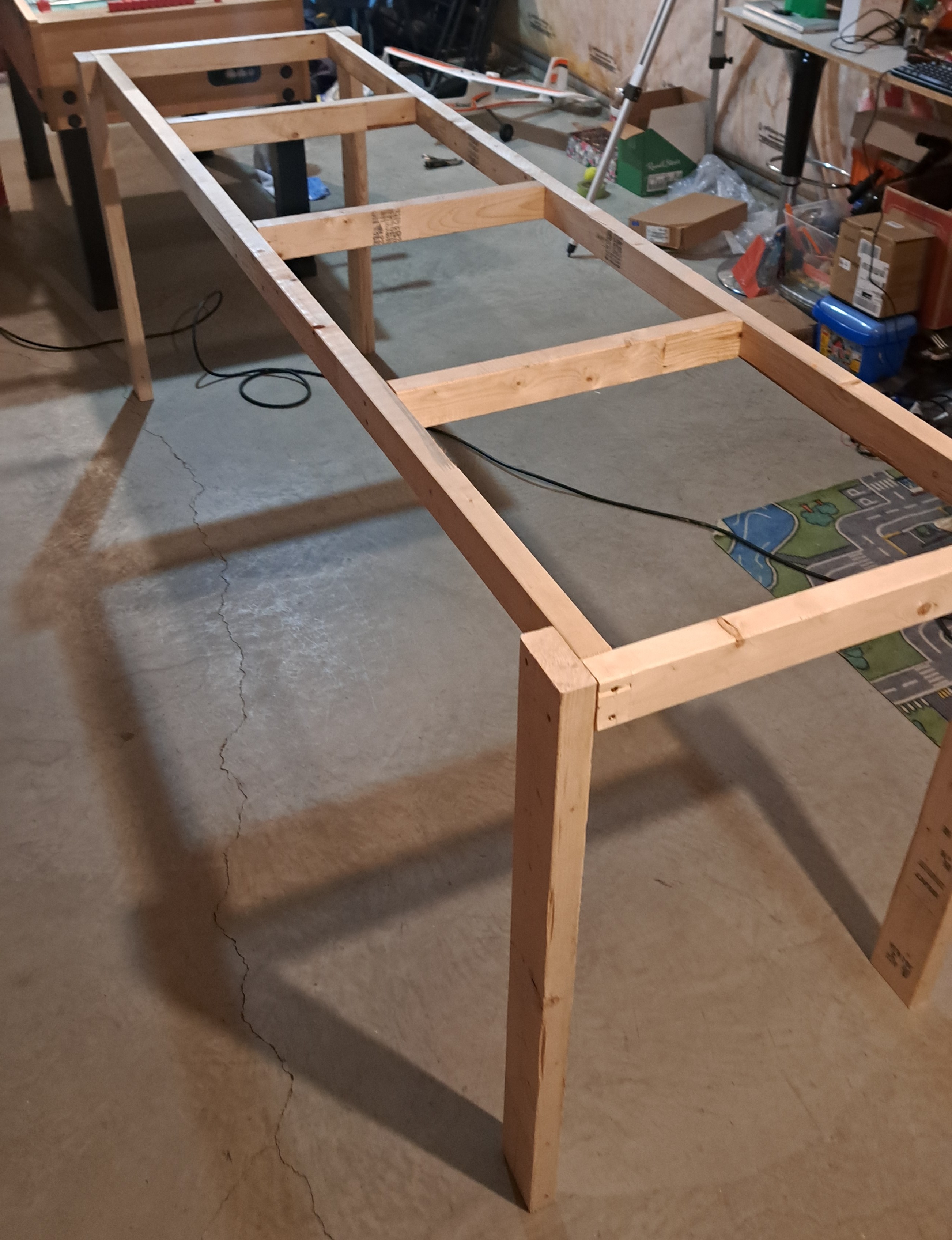 Adding the legs to the frame.